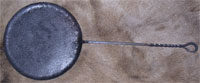 Gridle pan on deerskin background