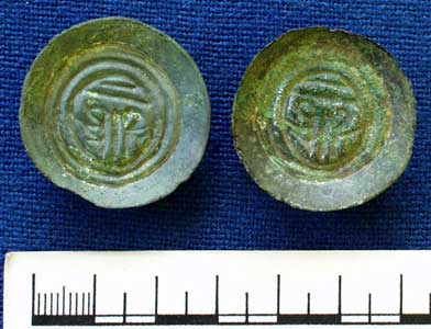 Button brooches from Brighthampton Oxfordshire (AN1909.489i-ii)