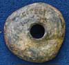 Lead spindle whorl from Sutton Courtenay (AN1933.522)