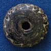 Spindle whorl from Abingdon, Oxfordshire (AN1935.582)