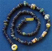 String of blue glass and other beads