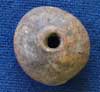 Spindle whorl from Woodeaton, Oxfordshire (AN1954.701b)