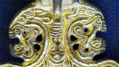 Decoratin on square headed brooch